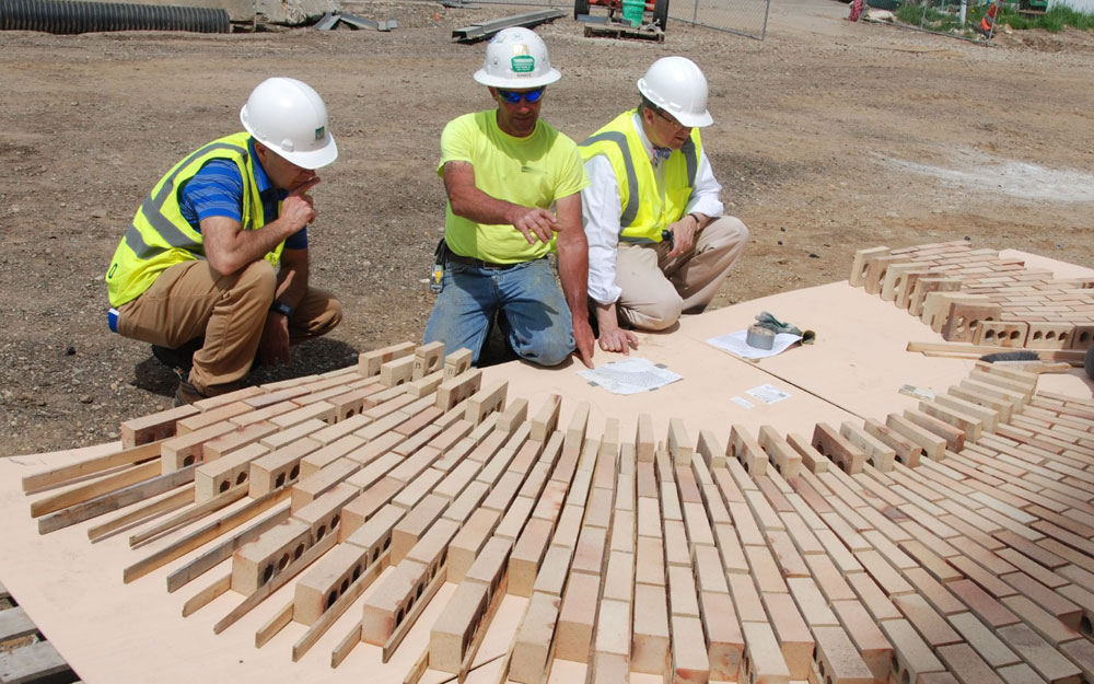 Three brick workers