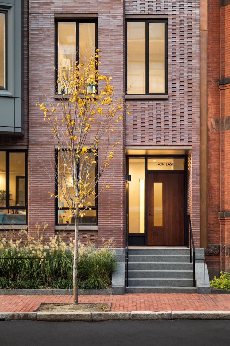 Exterior of townhome with bricks